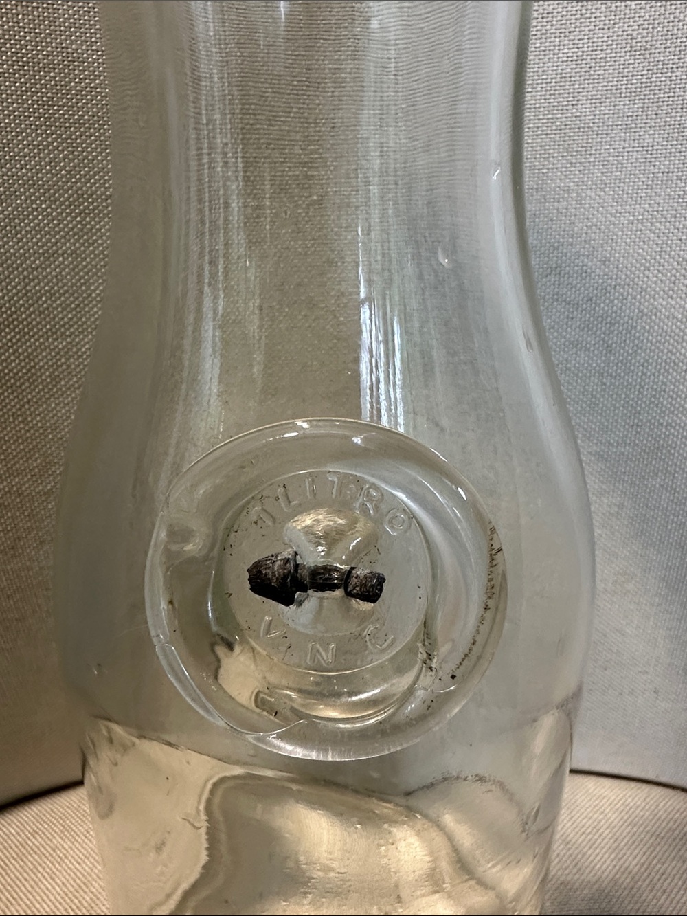 Clear Vintage Glass Bottle with Molded Logo